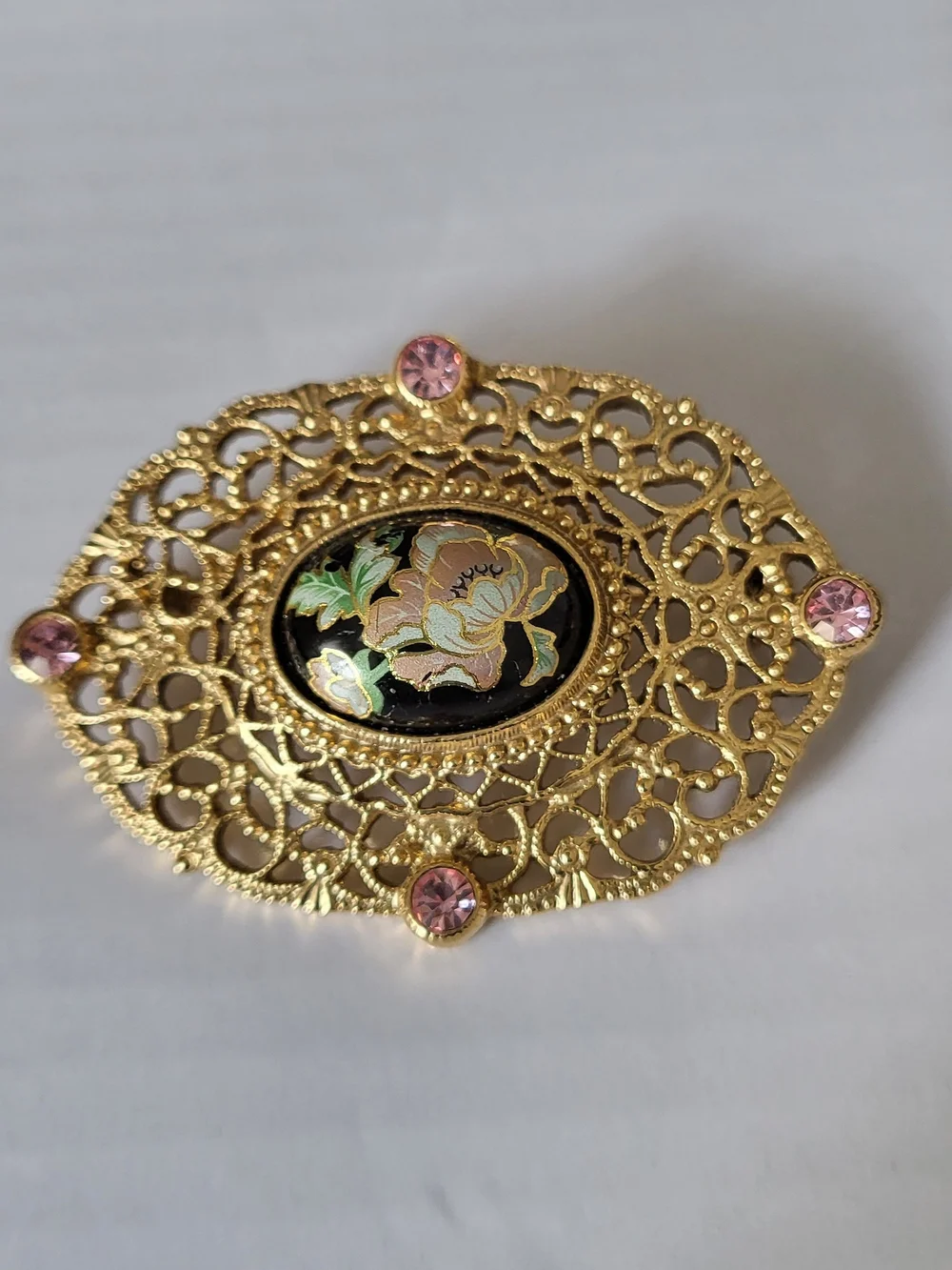 Vintage 1928 Brand Cloisonne Goldtone Filigree Floral Brooch with Pink Accents